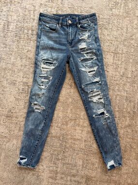American Eagle Outfitters Women's Distressed Hi-Rise Jeggings.